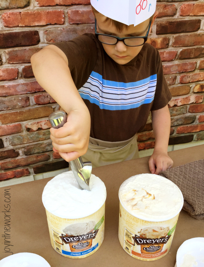 Scooping ice cream for the Ice Cream Shop while wearing his DIY Soda Jerk Hat #sweetertogether #ad