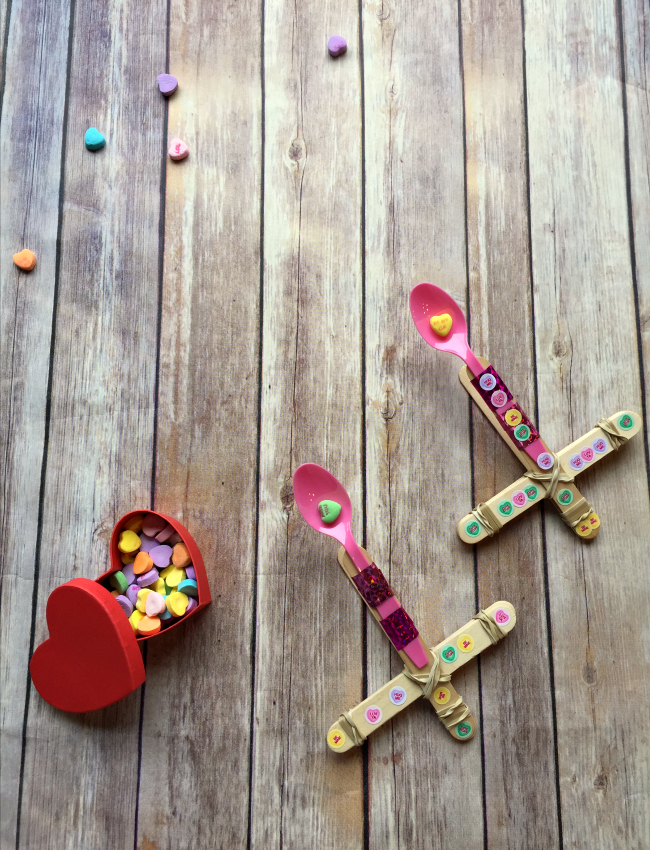 Looking for a fun activity for a class Valentine Party? Check out this Conversation Heart Valentine Catapult. It's a super easy #STEM activity for home or at school! Plus you can compare conversation hearts and other candy and eat the leftovers! =)