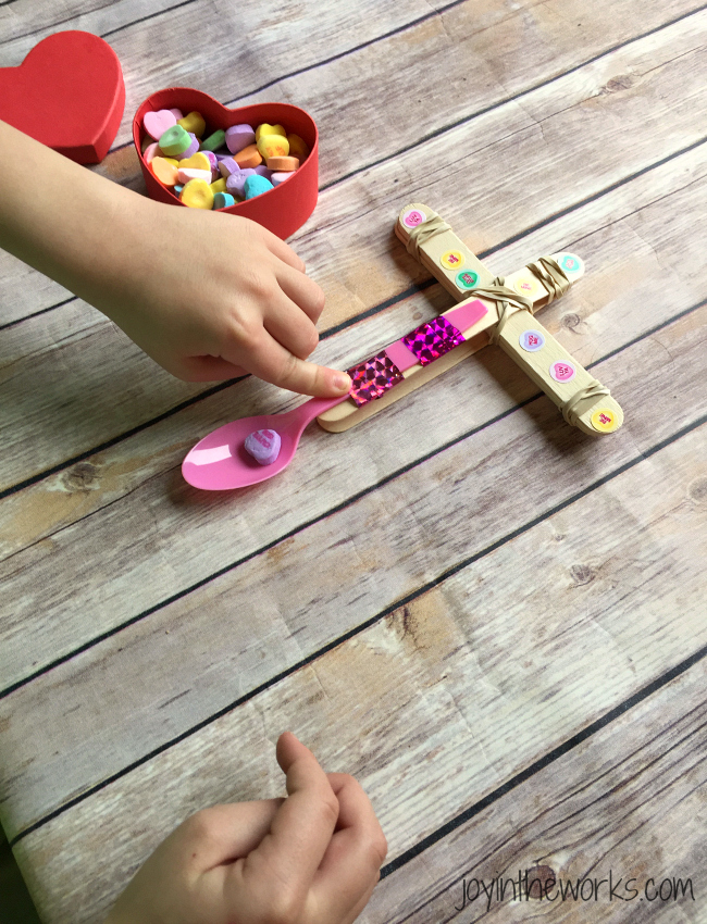 Looking for a fun activity for a class Valentine Party? Check out this Conversation Heart Valentine Catapult. It's a super easy #STEM activity for home or at school! Plus you can compare conversation hearts and other candy and eat the leftovers! =)