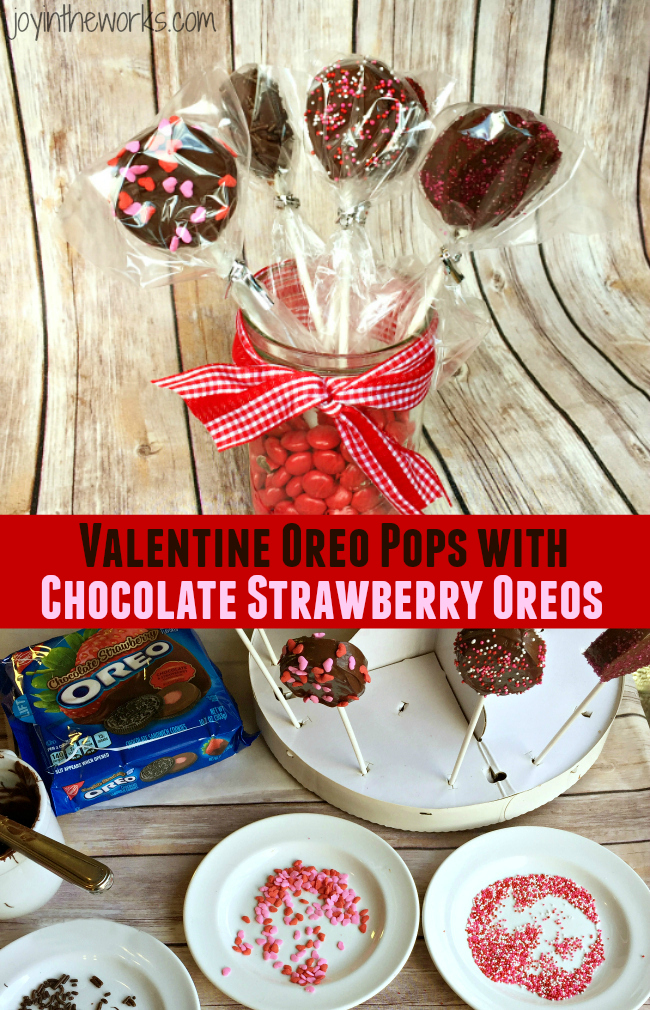 There is no better combination for Valentine's Day than strawberries and chocolate and these Valentine Oreo Pops using Chocolate Strawberry Oreos are an easy way to enjoy these flavors in a decadent Valentine's Day treat!