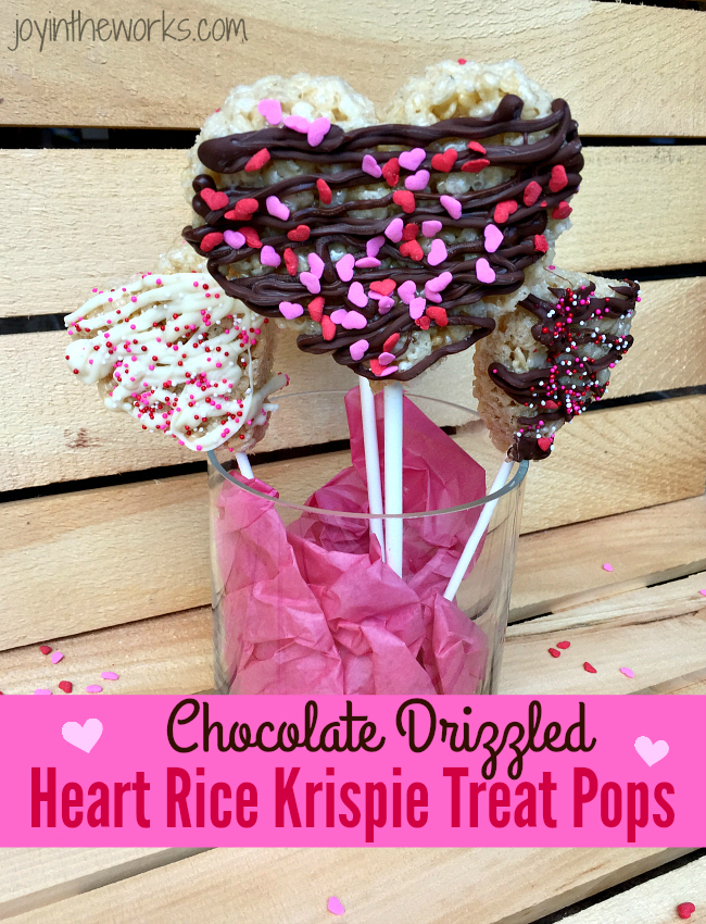 Chocolate Drizzled Heart Rice Krispie Treat Pops are so easy to make and are the perfect Valentine treat for the kids (and for the rest of us!!)!