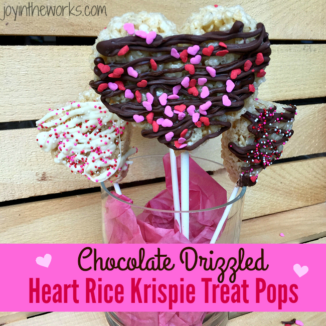 Chocolate Drizzled Heart Rice Krispie Treat Pops are so easy to make and are the perfect Valentine treat for the kids (and for the rest of us!!)!