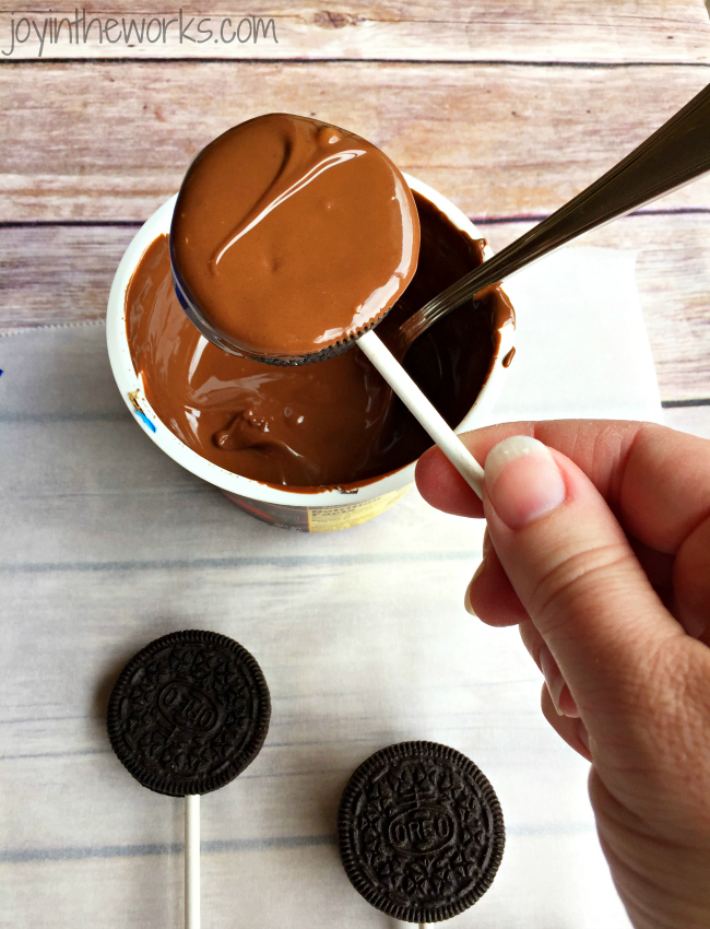 There is no better combination for Valentine's Day than strawberries and chocolate and these Valentine Oreo Pops using Chocolate Strawberry Oreos are an easy way to enjoy these flavors in a decadent Valentine's Day treat!