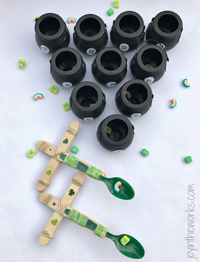 Make Lucky Charms Catapults, the perfect #STEM activity for St. Patrick's Day! Add in an extra level of fun with point values and pot of gold target practice!