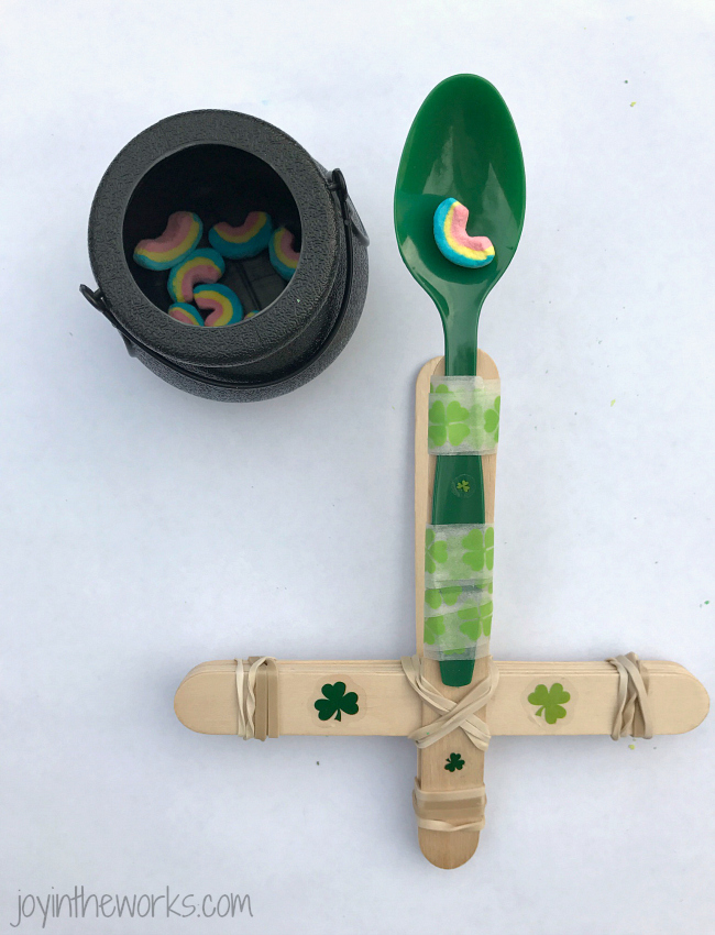 Make Lucky Charms Catapults, the perfect #STEM activity for St. Patrick's Day! Add in an extra level of fun with point values and pot of gold target practice!