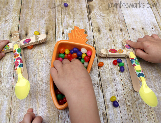 Looking for a fun Spring or Easter activity for an Easter Party or just a fun activity at home? Check out this Jelly Bean Catapult activity where the kids build their own catapults and launch the classic Easter candy! To make it extra fun, add point values and target practice! It's a great #STEM activity that ends with sweets!