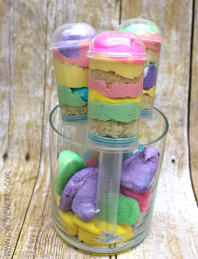 Peeps Push-Up Pops are so easy to make and they make such a fun Easter treat for kids! Plus they combine the best ingredients with cake, frosting and marshmallows in one dessert!