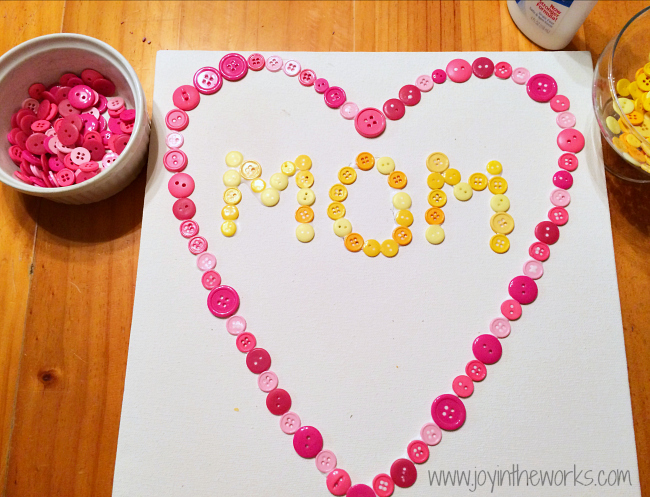 Looking for a kid made gift for Mother's Day or any other holiday? Check out this button heart that the kids made using buttons, glue and an art canvas