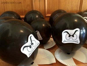 Stomp on goomba balloons for a Super Mario Brothers party game