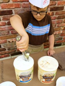 Scooping ice cream for the Ice Cream Shop while wearing his DIY Soda Jerk Hat