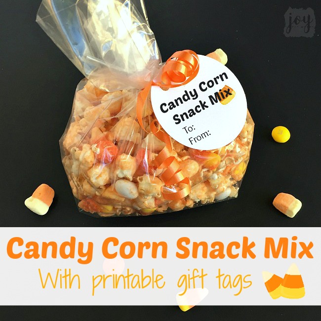 This Candy Corn Snack Mix is a must for all Candy Corn Lovers out there! It's the perfect Halloween treat of sweet and salty and comes with printable gift tags to give it away to friends and neighbors (if you have any left!)