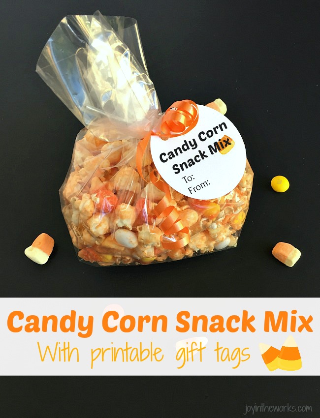 Whether you call it Candy Corn Trail Mix, Candy Corn Popcorn Mix or Candy Corn Snack Mix, this is the perfect Fall Snack for a Halloween Party or addition to a Boo Kit! Even better? It comes with a free printable Candy Corn Themed Halloween gift tag!