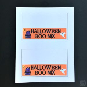 A Halloween Boo Mix Snack Bag Topper is perfect for taking home snacks after a Halloween Party! Even better? Have kids create their own Halloween Boo Mix with my printable follow-along directions!