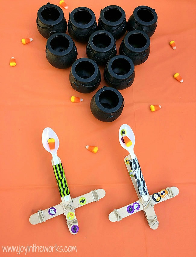 The perfect Halloween STEM activity is a Candy Corn Catapult! Even better? Try launching the candy corn, eyeballs and mini-pumpkins into cauldron targets!