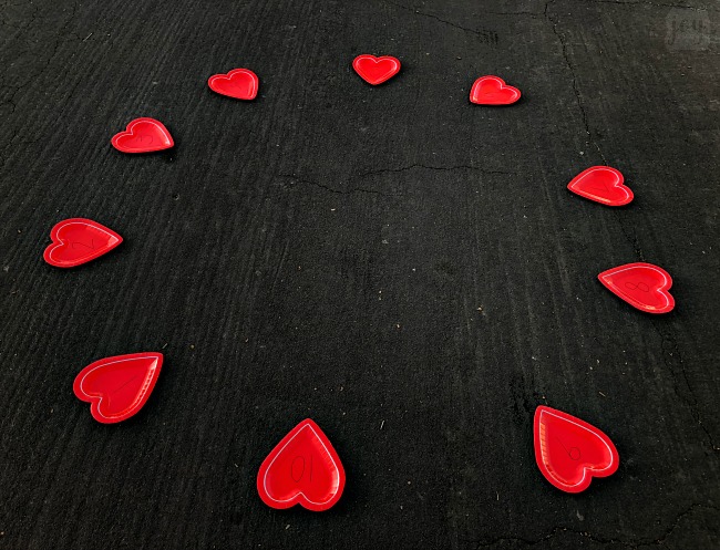 Practice addition, counting, subitizing and more with these simple Valentine themed math games using heart shaped paper plates! #valentinesday #mathgames #addition #subtraction #counting #math #handsonlearning