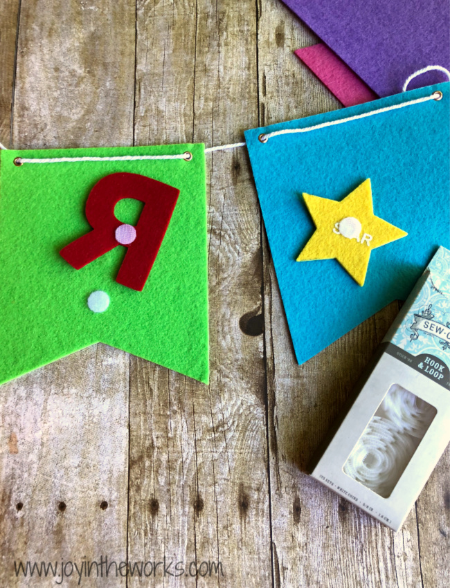 Make your own DIY Felt Banner with rainbow felt and interchangeable velcro letters so that you can use it for every holiday and special occasion!